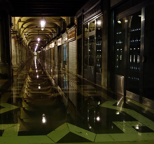 This corridor, which circles St Mark's, is 6 inches higher than the square itself, and it also flooded over.