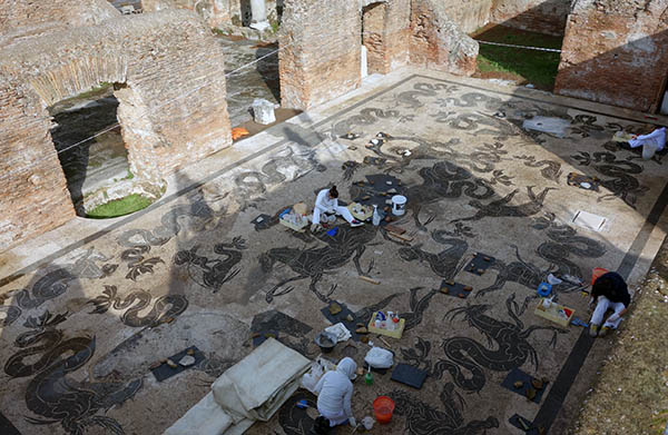 Archaeologists preserving the mosaics